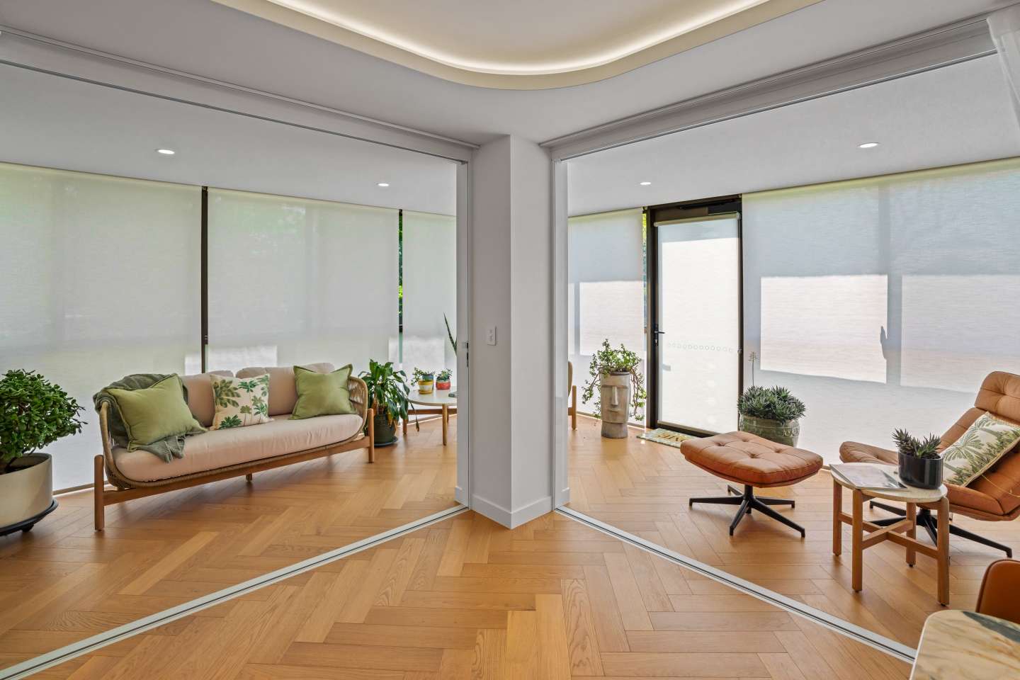 Luxury Unit Renovation - Sunroom with Electronic blinds down