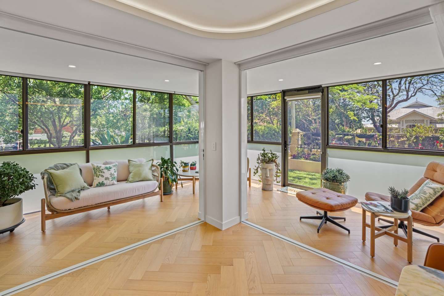 Luxury Unit Renovation - Sunroom with Electronic blinds up